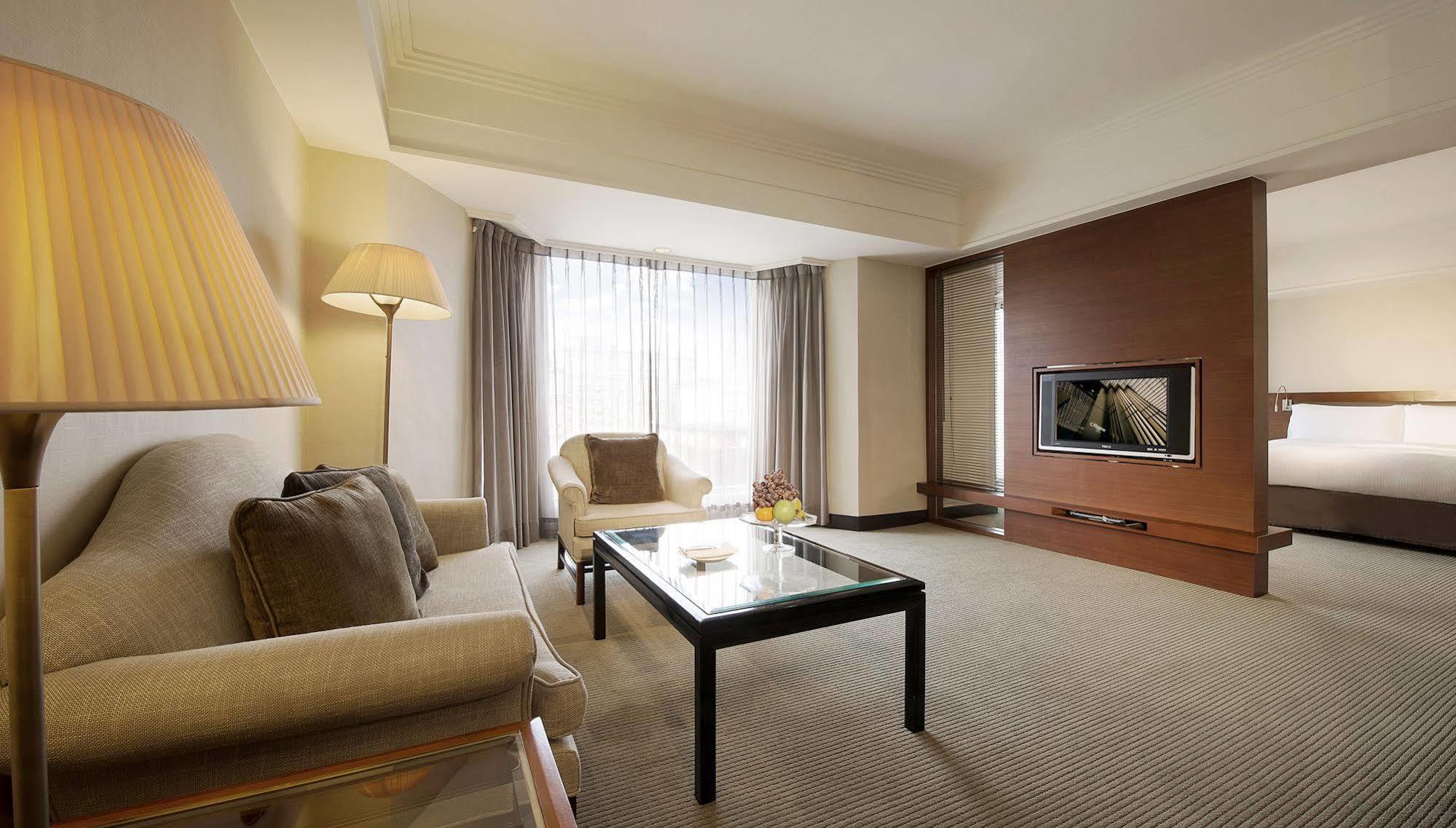 Hotel Regent Taipeh Exterior foto A living room in a hotel suite